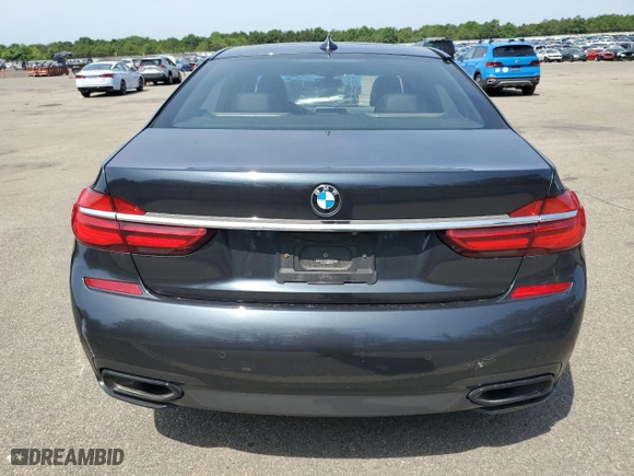 2019 BMW 7 Series 740i xDrive with VIN WBA7E4C56KGV71028, listed as a Copart auction lot 76860474 with 66,657 mi miles and Non Repairable. Bid and sale history available at carsss.com. Image 6.