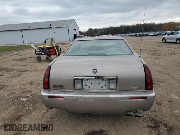 2000 Cadillac Eldorado with VIN 1G6EL12Y5YU166723, listed as a Copart auction lot 82612034 with 80,839 mi miles and Salvage title. Bid and sale history available at DreamBid. Image 6.