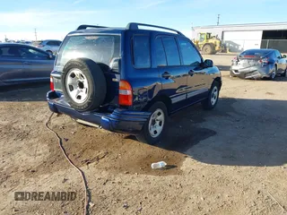 2003 Suzuki Vitara z VIN 2S3TE52V436101091, wystawiony jako IAAI lot #41472279 z przebiegiem 163 429 mil mil oraz . Historia ofert i sprzedaży dostępna na DreamBid. Obrazek 4.