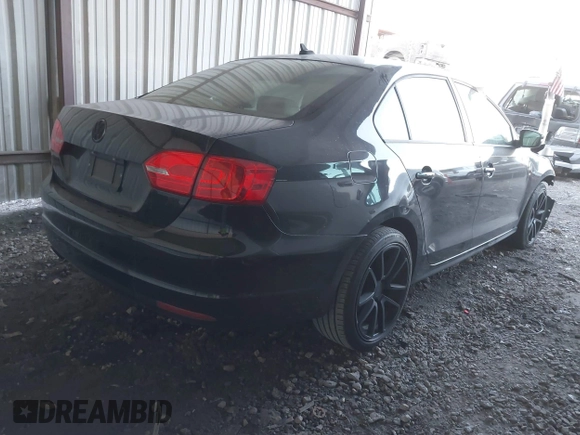 2014 Volkswagen Jetta Sedan SE w/Connectivity with VIN 3VWD07AJ4EM388319, listed as a IAAI auction lot 41246677 with 84,428 mi miles. Bid and sale history available at carsss.com. Image 4.
