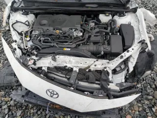 2025 Toyota Camry LE z VIN 4T1DAACK4SU536541, wystawiony jako Copart lot #56383535 z przebiegiem Nie podano mil oraz Szkoda całkowita • Salvage title. Historia ofert i sprzedaży dostępna na DreamBid. Obrazek 11.