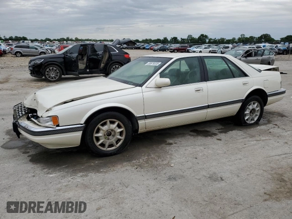 1997 Cadillac Seville Luxury SLS z VIN 1G6KS52Y0VU819998, wystawiony jako Copart lot #55979335 z przebiegiem 87 054 mil mil oraz Szkoda całkowita • Salvage title. Historia ofert i sprzedaży dostępna na DreamBid. Obrazek 1.