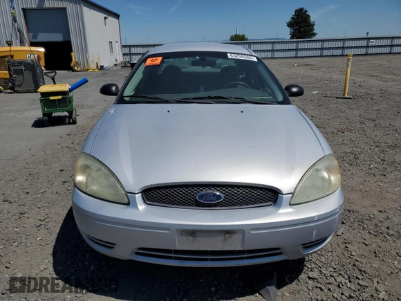 2005 Ford Taurus SE with VIN 1FAFP53U25A303516, listed as a Copart auction lot 63250505 with 203,463 mi miles and Salvage title. Bid and sale history available at DreamBid. Image 5.