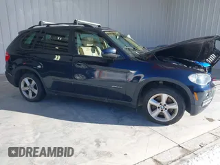 2010 BMW X5 35d with VIN 5UXFF0C50ALJ99887, listed as a IAAI auction lot 41585772 with 96,983 mi miles. Bid and sale history available at carsss.com. Image 1.