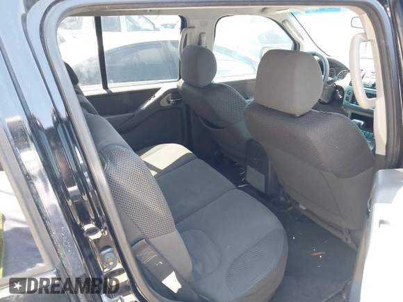 2009 Nissan Pathfinder S with VIN 5N1AR18B49C608651, listed as a IAAI auction lot 42015628 with 215,531 mi miles. Bid and sale history available at carsss.com. Image 7.