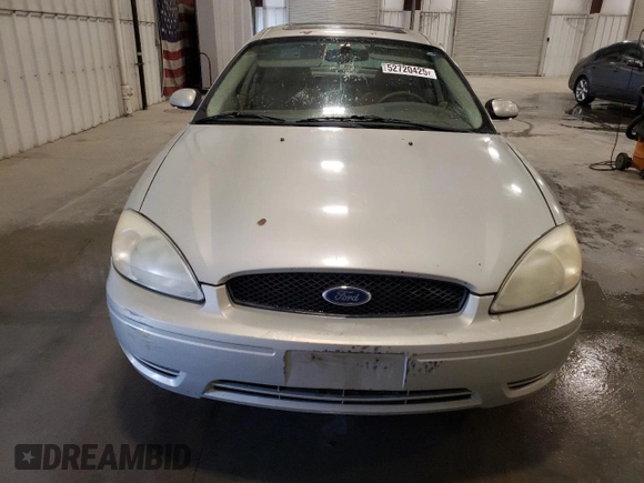 2007 Ford Taurus SEL with VIN 1FAFP56UX7A162399, listed as a Copart auction lot 52720425 with 148,240 mi miles and Salvage Title. Bid and sale history available at DreamBid. Image 5.