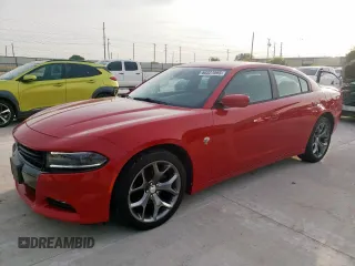2015 Dodge Charger SXT with VIN 2C3CDXHG0FH886812, listed as a Copart auction lot 60327095 with 135,585 mi miles and Clean title. Bid and sale history available at DreamBid. Image 1.