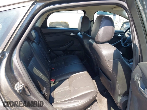 2014 Ford Focus Titanium with VIN 1FADP3N22EL317007, listed as a IAAI auction lot 42641134 with 159,705 mi miles and . Bid and sale history available at DreamBid. Image 8.