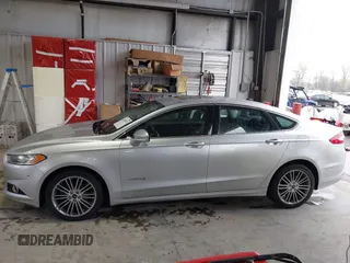2013 Ford Fusion SE Hybrid with VIN 3FA6P0LU2DR319335, listed as a IAAI auction lot 42007573 with 135,099 mi miles. Bid and sale history available at carsss.com. Image 14.