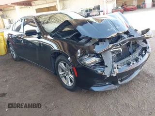 2015 Dodge Charger SE z VIN 2C3CDXBGXFH777721, wystawiony jako IAAI lot #42023473 z przebiegiem 215 761 mil mil oraz . Historia ofert i sprzedaży dostępna na DreamBid. Obrazek 1.