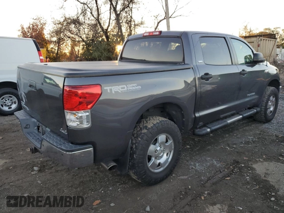 2011 Toyota Tundra 4WD Truck with VIN 5TFDY5F12BX205210, listed as a Copart auction lot 79915794 with 214,543 mi miles and Salvage Title. Bid and sale history available at carsss.com. Image 3.