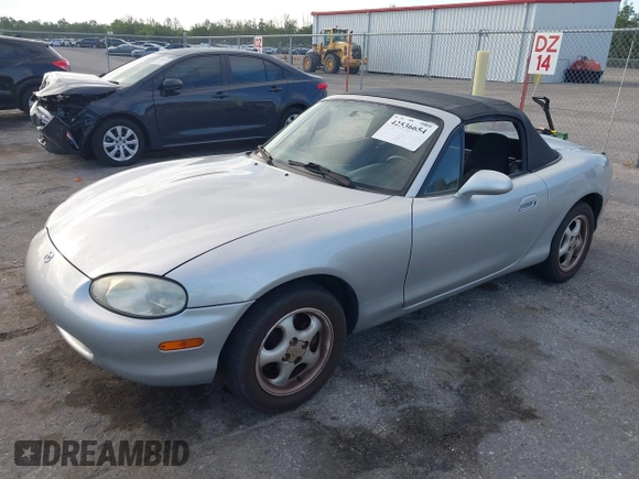 1999 Mazda MX-5 Miata with VIN JM1NB3534X0124237, listed as a IAAI auction lot 42536654 with 92,696 mi miles and . Bid and sale history available at DreamBid. Image 18.