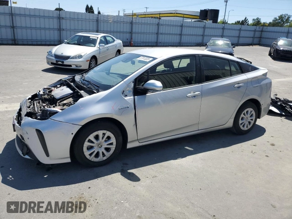 2020 Toyota Prius L Eco with VIN JTDKARFUXL3120671, listed as a Copart auction lot 57913335 with 67,933 mi miles and Salvage title. Bid and sale history available at DreamBid. Image 1.