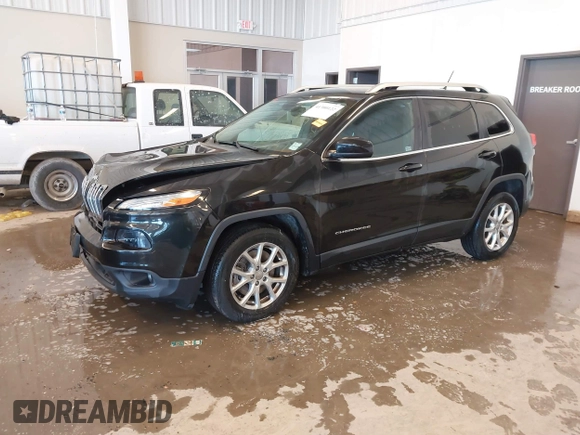 2015 Jeep Cherokee Latitude with VIN 1C4PJLCB9FW536767, listed as a IAAI auction lot 41380122 with 192,535 mi miles. Bid and sale history available at carsss.com. Image 22.