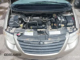 2005 Chrysler Town & Country Touring z VIN 2C8GP54L25R491310, wystawiony jako IAAI lot #42363567 z przebiegiem 203 608 mil mil oraz . Historia ofert i sprzedaży dostępna na DreamBid. Obrazek 10.