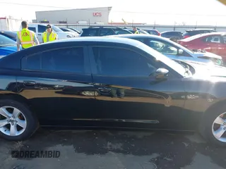 2014 Dodge Charger SE with VIN 2C3CDXBG9EH116776, listed as a IAAI auction lot 41465565 with 128,319 mi miles. Bid and sale history available at carsss.com. Image 14.