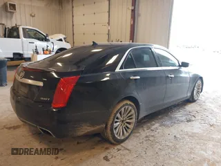 2014 Cadillac CTS Luxury AWD with VIN 1G6AX5SX2E0195357, listed as a IAAI auction lot 41677831 with 152,567 mi miles and . Bid and sale history available at DreamBid. Image 4.