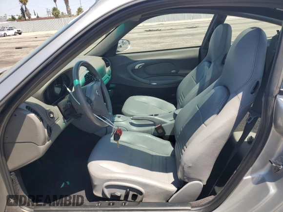 2003 Porsche 911 with VIN WP0BA29923S635457, listed as a Copart auction lot 61446545 with 85,602 mi miles and Salvage title. Bid and sale history available at DreamBid. Image 7.