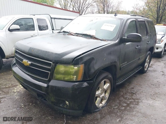 2007 Chevrolet Tahoe LT with VIN 1GNFK13047R103134, listed as a IAAI auction lot 41963963 with 209,882 mi miles. Bid and sale history available at carsss.com. Image 2.