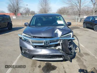 2021 Honda Pilot EX-L with VIN 5FNYF6H54MB028203, listed as a IAAI auction lot 41641116 with 46,755 mi miles and . Bid and sale history available at DreamBid. Image 12.