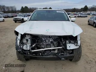 2023 Nissan Frontier SV with VIN 1N6ED1FJ9PN653677, listed as a Copart auction lot 43245835 with 20,594 mi miles and Salvage title. Bid and sale history available at DreamBid. Image 5.