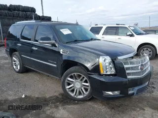 2014 Cadillac Escalade Platinum z VIN 1GYS4DEF3ER175700, wystawiony jako IAAI lot #41619994 z przebiegiem 141 965 mil mil oraz . Historia ofert i sprzedaży dostępna na DreamBid. Obrazek 1.