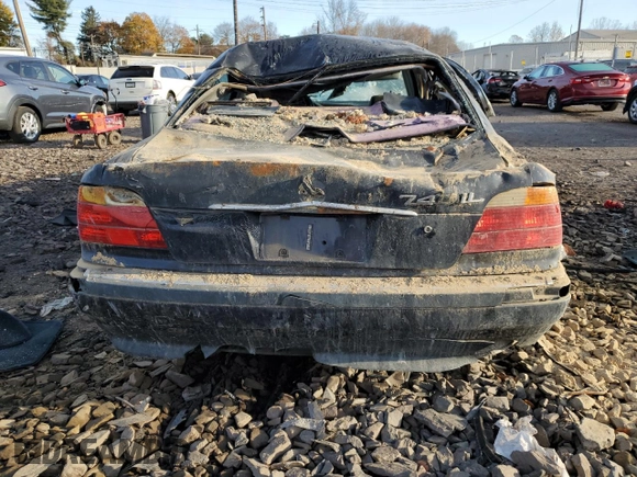 2000 BMW 7 Series 740iL with VIN WBAGH8346YDP11238, listed as a Copart auction lot 81122224 with 128,539 mi miles and Salvage Title. Bid and sale history available at carsss.com. Image 6.