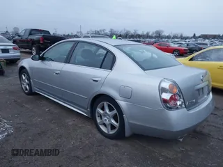 2003 Nissan Altima SE z VIN 1N4BL11E33C302441, wystawiony jako IAAI lot #41156458 z przebiegiem 123 796 mil mil oraz . Historia ofert i sprzedaży dostępna na DreamBid. Obrazek 3.