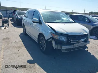 2014 Honda Odyssey Touring с VIN 5FNRL5H90EB066930, выставлен на аукционе IAAI как лот 41973613 с пробегом 167 634 миль миль и . История ставок и продаж доступна на DreamBid. Изображение 1.