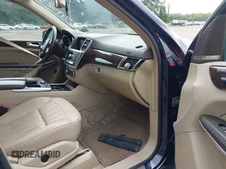 2014 Mercedes-Benz GL 450 с VIN 4JGDF7CE1EA286051, выставлен на аукционе IAAI как лот 42549323 с пробегом 143 640 миль миль и . История ставок и продаж доступна на DreamBid. Изображение 5.