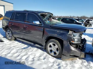 2015 Chevrolet Tahoe LTZ z VIN 1GNSKCKC8FR223832, wystawiony jako Copart lot #87023514 z przebiegiem Nie podano mil oraz Szkoda całkowita • Salvage title. Historia ofert i sprzedaży dostępna na DreamBid. Obrazek 4.