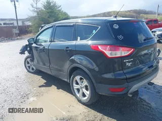 2014 Ford Escape SE with VIN 1FMCU9GX2EUD41176, listed as a IAAI auction lot 42028822 with 101,595 mi miles and . Bid and sale history available at DreamBid. Image 3.