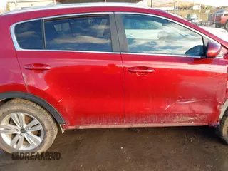 2018 Kia Sportage LX z VIN KNDPMCAC8J7360591, wystawiony jako IAAI lot #38685134 z przebiegiem 95 649 mil mil oraz . Historia ofert i sprzedaży dostępna na DreamBid. Obrazek 13.