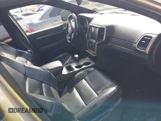 2014 Jeep Grand Cherokee Summit с VIN 1C4RJEJG1EC295063, выставлен на аукционе IAAI как лот 41569926 с пробегом 205 404 миль миль и . История ставок и продаж доступна на DreamBid. Изображение 5.