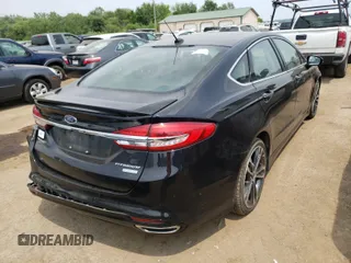 2017 Ford Fusion Titanium с VIN 3FA6P0K93HR170257, выставлен на аукционе Copart как лот 50977791 с пробегом 96 692 миль миль и Списание • Salvage title. История ставок и продаж доступна на DreamBid. Изображение 4.