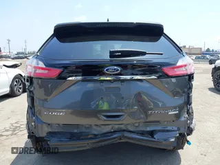 2019 Ford Edge Titanium z VIN 2FMPK3K95KBB22114, wystawiony jako IAAI lot #42432814 z przebiegiem 99 106 mil mil oraz . Historia ofert i sprzedaży dostępna na DreamBid. Obrazek 17.