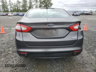 2015 Ford Fusion SE z VIN 3FA6P0H95FR206535, wystawiony jako Copart lot #54242105 z przebiegiem 83 001 mil mil oraz Szkoda całkowita • Salvage title. Historia ofert i sprzedaży dostępna na DreamBid. Obrazek 6.