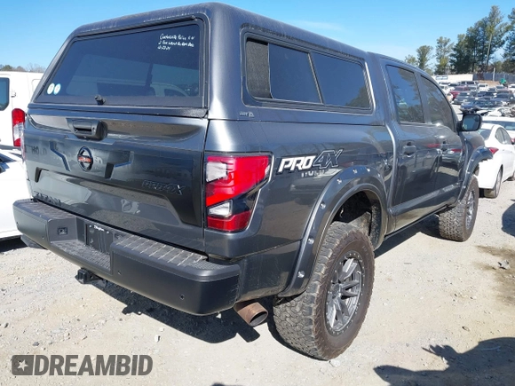 2021 Nissan Titan Pro-4X with VIN 1N6AA1ED0MN504654, listed as a IAAI auction lot 41240824 with 68,533 mi miles and . Bid and sale history available at DreamBid. Image 4.