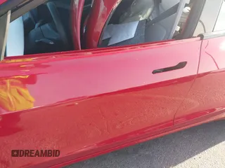 2023 Tesla Model 3 with VIN 5YJ3E1EA9PF695547, listed as a IAAI auction lot 40100334 with Not Provided miles and . Bid and sale history available at DreamBid. Image 21.