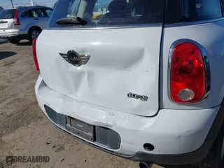 2013 MINI Cooper Countryman with VIN WMWZB3C51DWM31277, listed as a IAAI auction lot 41506486 with 79,006 mi miles. Bid and sale history available at carsss.com. Image 6.
