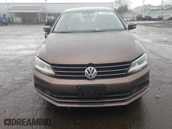 2015 Volkswagen Jetta SE z VIN 3VWD17AJ1FM422960, wystawiony jako Copart lot #55860335 z przebiegiem 87 616 mil mil oraz Czysty tytuł • Clean title. Historia ofert i sprzedaży dostępna na DreamBid. Obrazek 5.