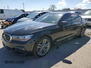 2017 BMW 7 Series 740e xDrive iPerformance with VIN WBA7J2C33HG497980, listed as a Copart auction lot 50244384 with 115,728 mi miles. Bid and sale history available at carsss.com. Image 1.
