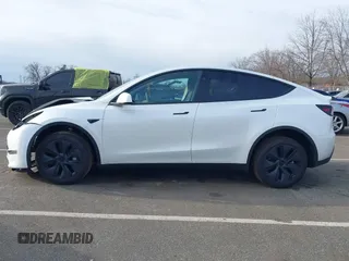 2025 Tesla Model Y Long Range with VIN 7SAYGDEE1SA343429, listed as a IAAI auction lot 41504455 with 1,284 mi miles and . Bid and sale history available at carsss.com. Image 14.