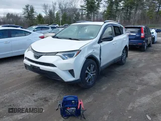 2018 Toyota RAV4 LE with VIN JTMBFREV5JJ738405, listed as a IAAI auction lot 41956145 with 100,593 mi miles and . Bid and sale history available at DreamBid. Image 19.