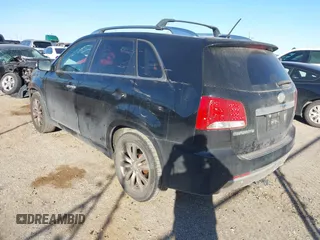 2012 Kia Sorento SX with VIN 5XYKW4A26CG207358, listed as a IAAI auction lot 41521909 with 215,689 mi miles. Bid and sale history available at carsss.com. Image 3.