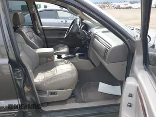 2004 Jeep Grand Cherokee Limited with VIN 1J4GW58N54C372118, listed as a IAAI auction lot 42526424 with 187,430 mi miles and . Bid and sale history available at DreamBid. Image 5.