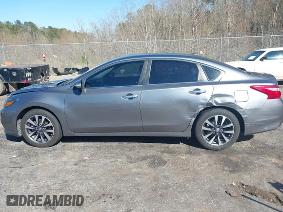 2016 Nissan Altima S z VIN 1N4AL3AP8GC139770, wystawiony jako IAAI lot #41750812 z przebiegiem 116 717 mil mil oraz . Historia ofert i sprzedaży dostępna na DreamBid. Obrazek 14.