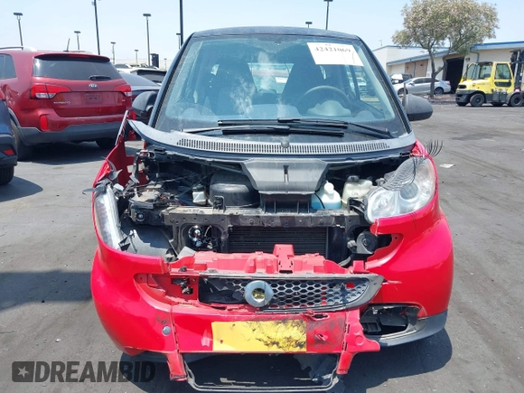2014 Smart fortwo Pure z VIN WMEEJ3BAXEK744079, wystawiony jako IAAI lot #42421069 z przebiegiem 79 788 mil mil oraz . Historia ofert i sprzedaży dostępna na DreamBid. Obrazek 6.