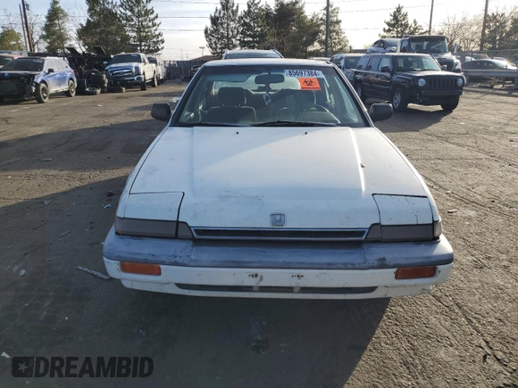 1987 Honda Accord z VIN JHMCA5633HC044303, wystawiony jako Copart lot #85697384 z przebiegiem 19 871 mil mil oraz Nie do naprawy • Non repairable. Historia ofert i sprzedaży dostępna na DreamBid. Obrazek 5.