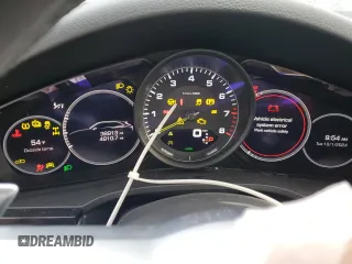 2021 Porsche Cayenne E-Hybrid Hybrid z VIN WP1AE2AY8MDA24095, wystawiony jako Copart lot #73733544 z przebiegiem 36 913 mil mil oraz Szkoda całkowita • Salvage title. Historia ofert i sprzedaży dostępna na DreamBid. Obrazek 9.